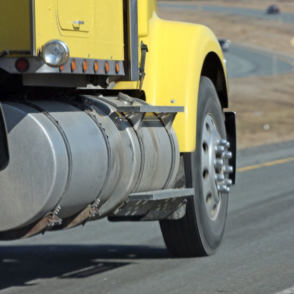 yellow truck on road