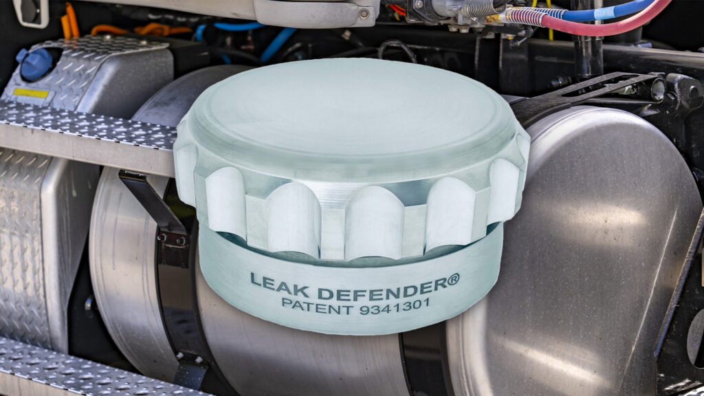 A close up of the leak defender logo on a tank