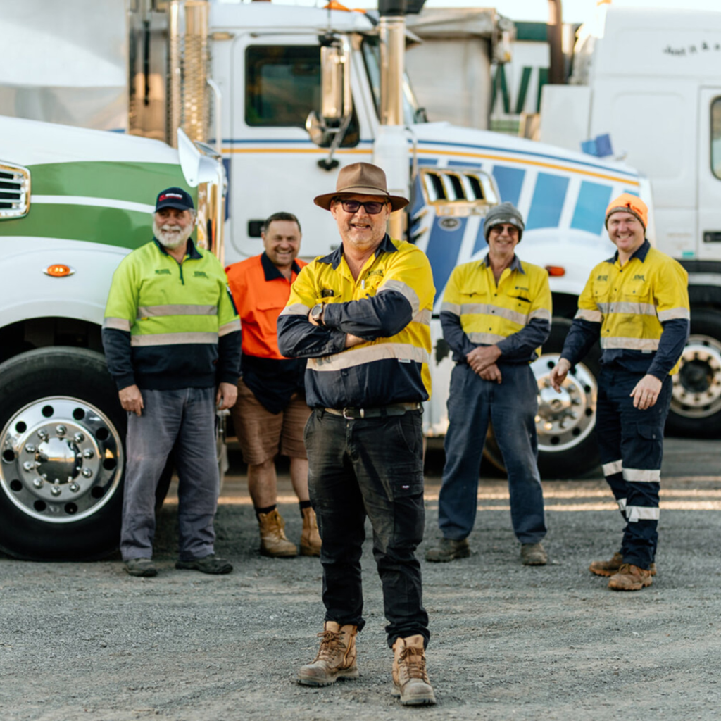 Team of truckers outside their cabin