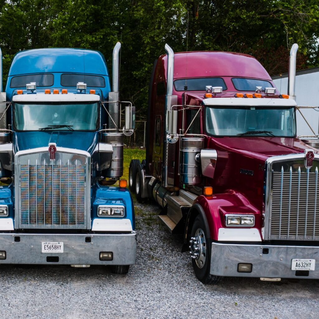 trucks parked on gravel