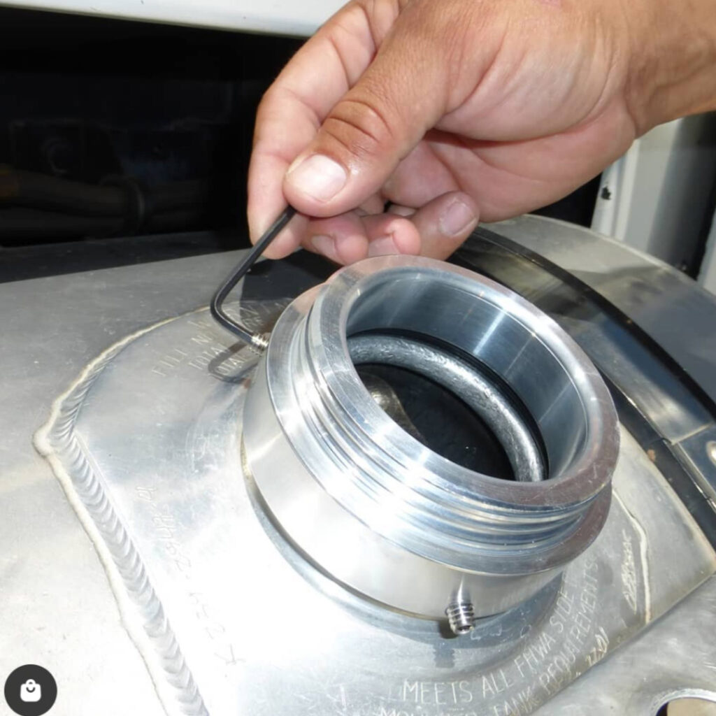 Close-up showing a loose or leaky fuel cap.
